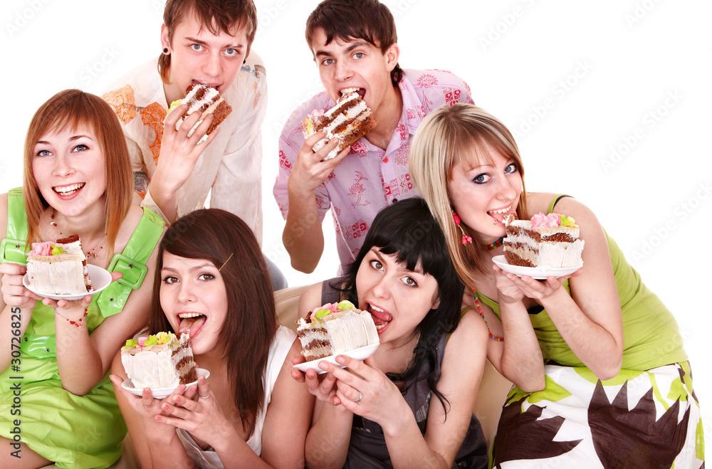 people eating the cake