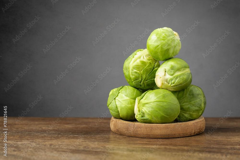 fresh brussels sprouts on a wooden table