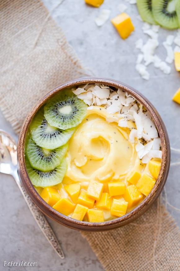 Close-up of tayberries, mango chunks, and pineapple tidbits in a bowl