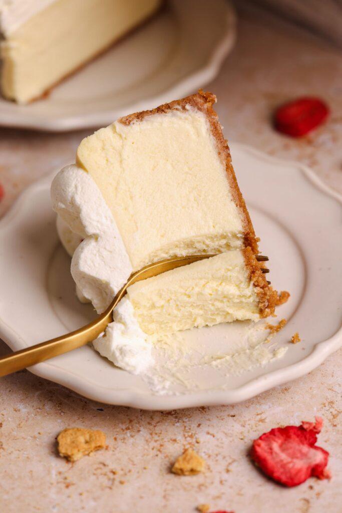 a close-up shot of a perfectly baked cheesecake with a smooth, creamy texture