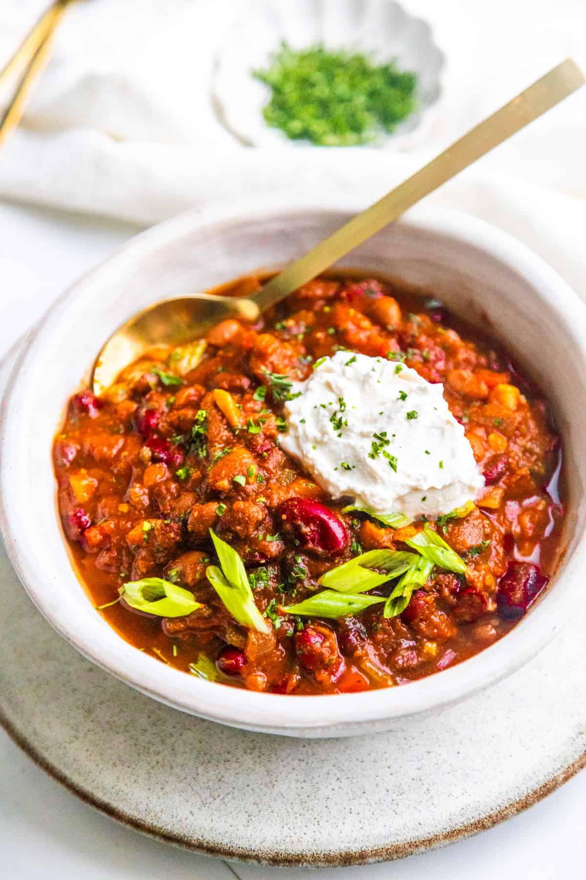 a pot of vegan chili simmering on the stovetop