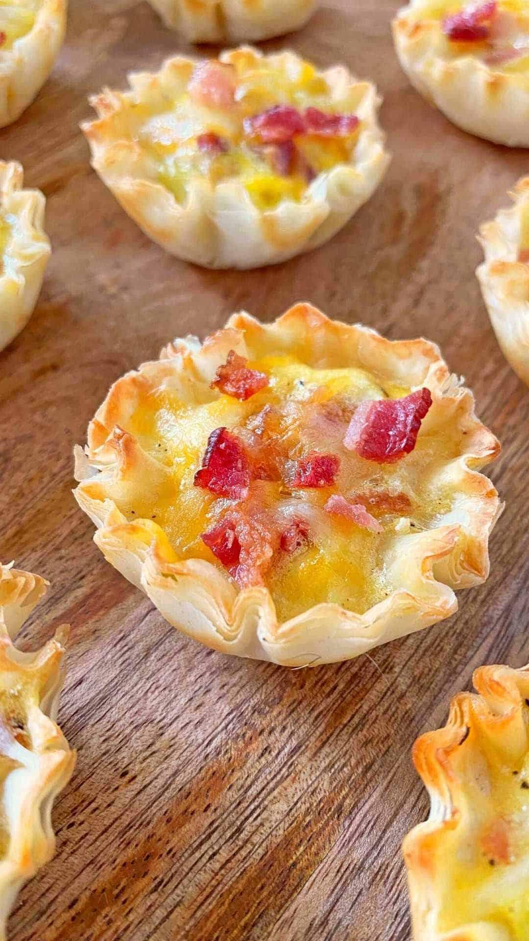 close up of mini quiche charcuterie board