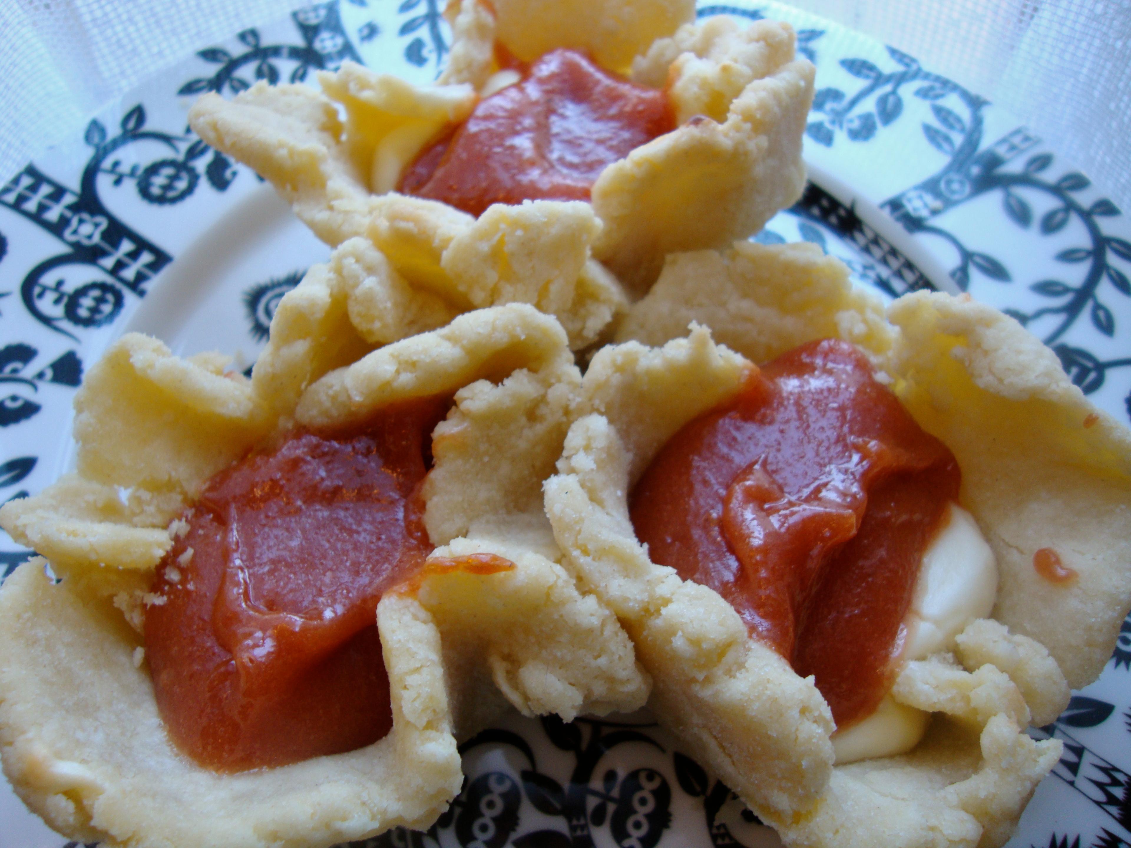 Close-up shot of a slice of guava cream cheese tart being served on a plate