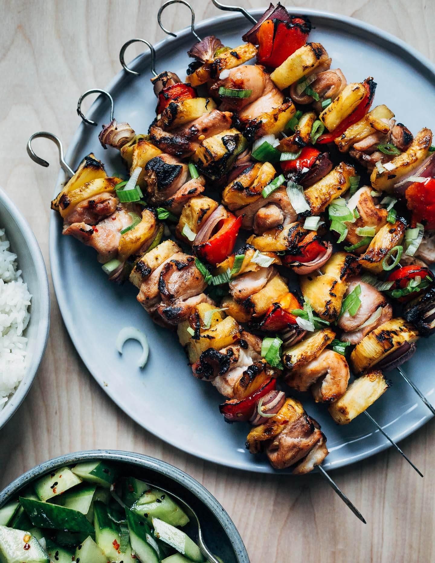 skewers with grilled pineapple, chicken and bell pepper on plate