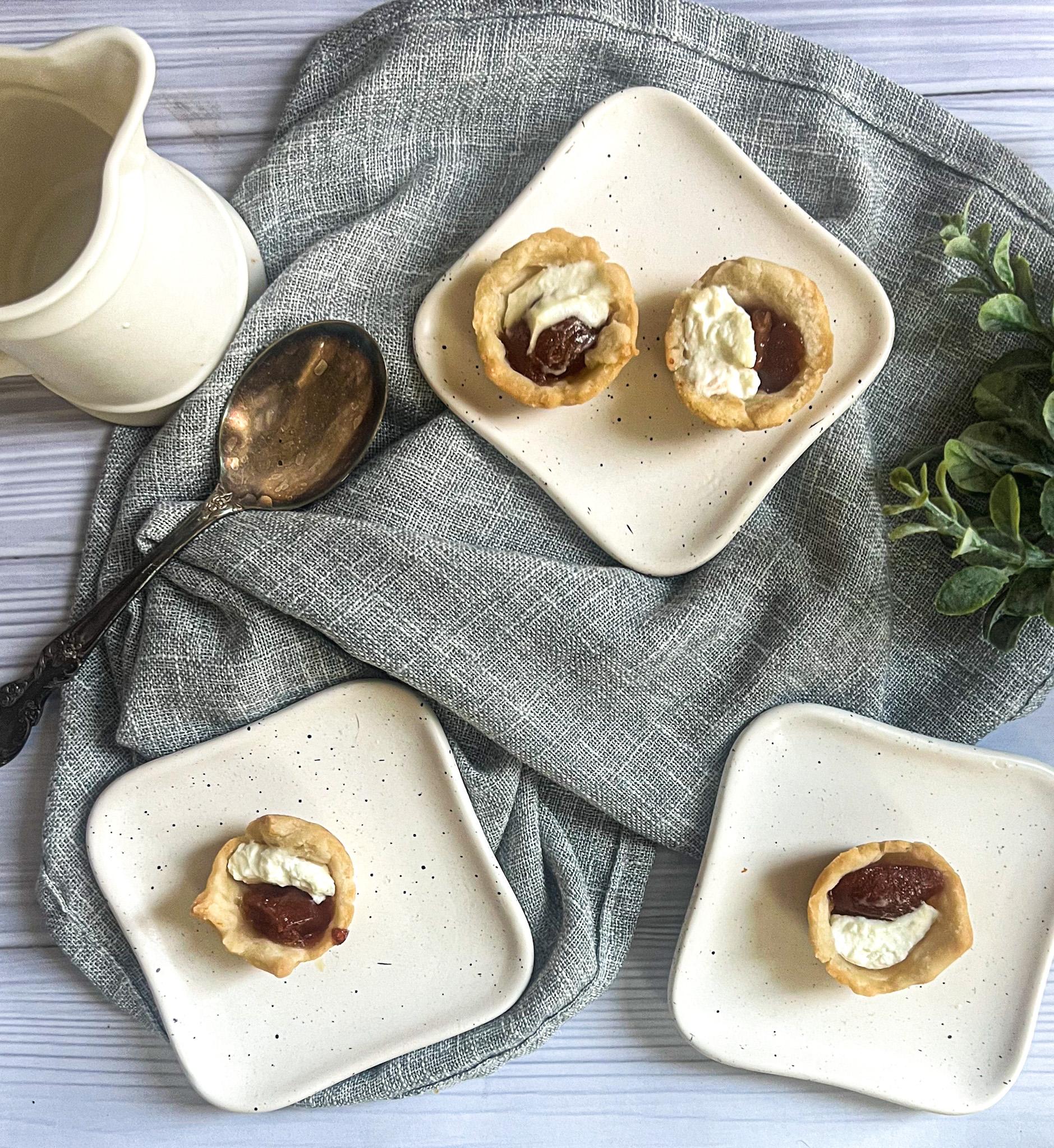 Ingredients for guava cream cheese tart laid out on a wooden countertop