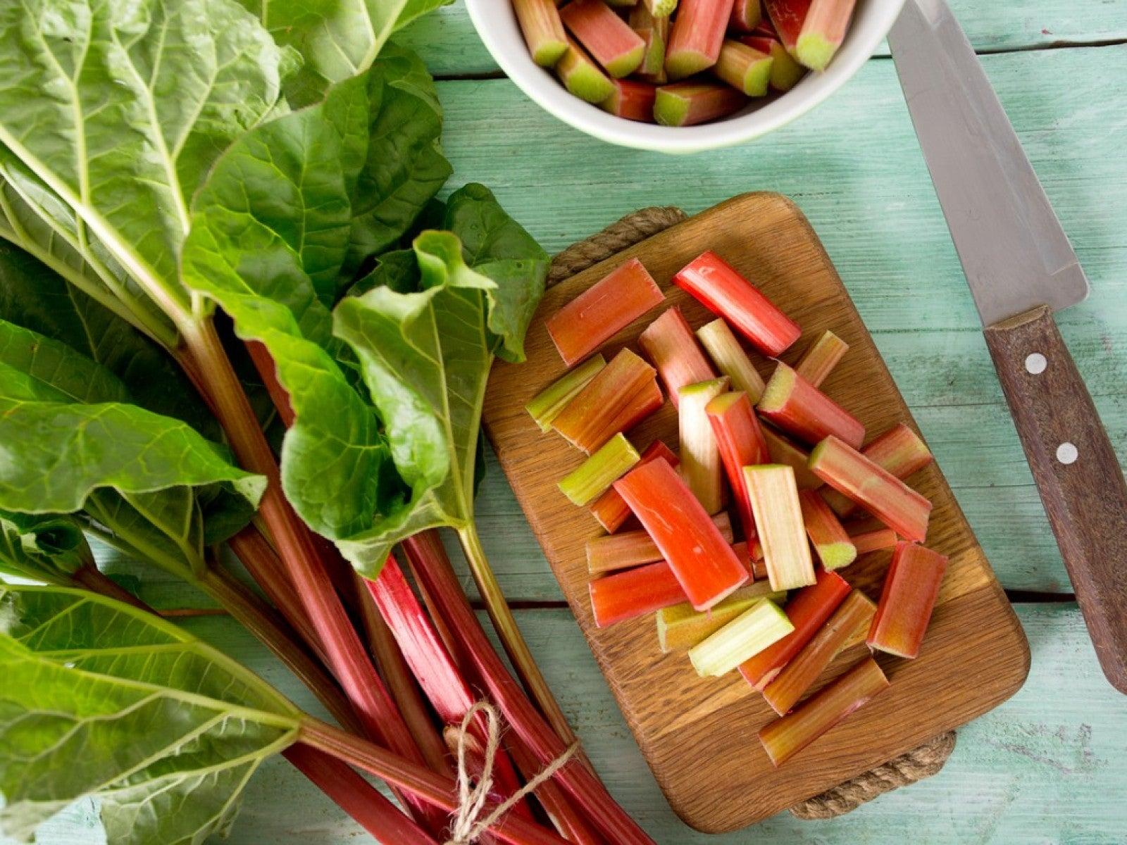 rhubarb stalks on a cutting board