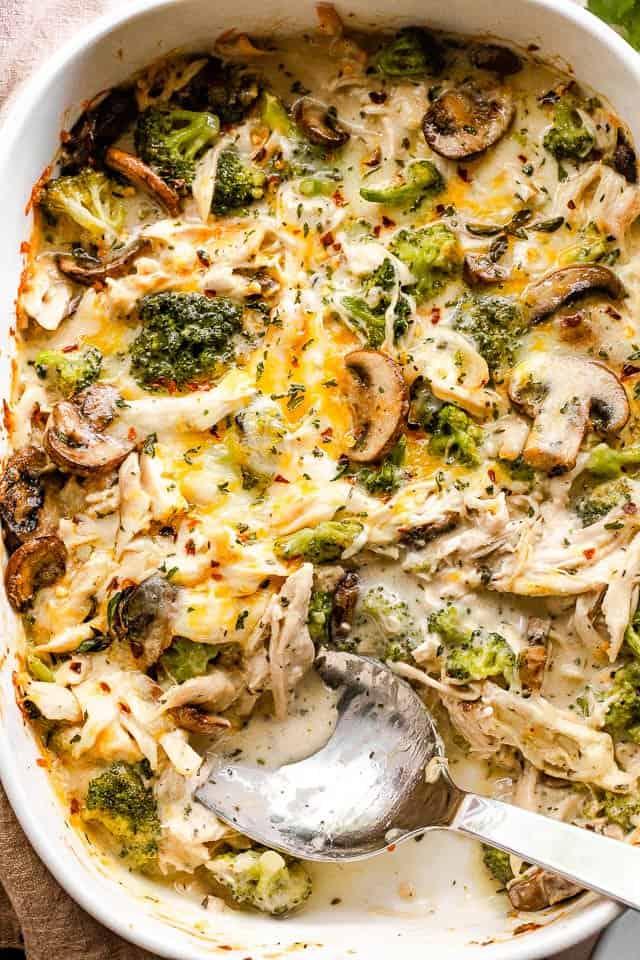overhead shot of easy cheesy chicken and broccoli bake in a baking dish