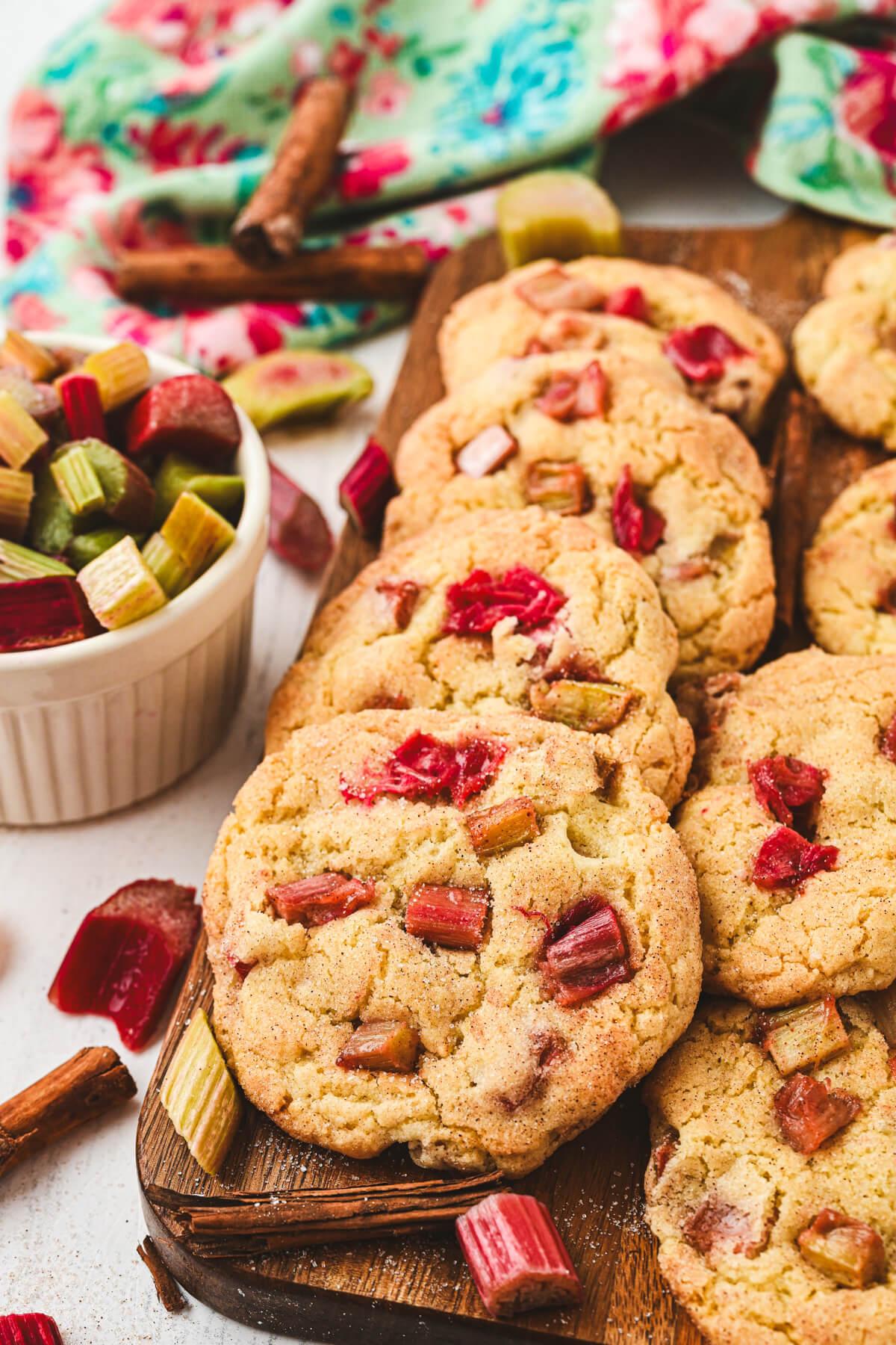 close-up shot of rhubarb protein cookies on a wooden board