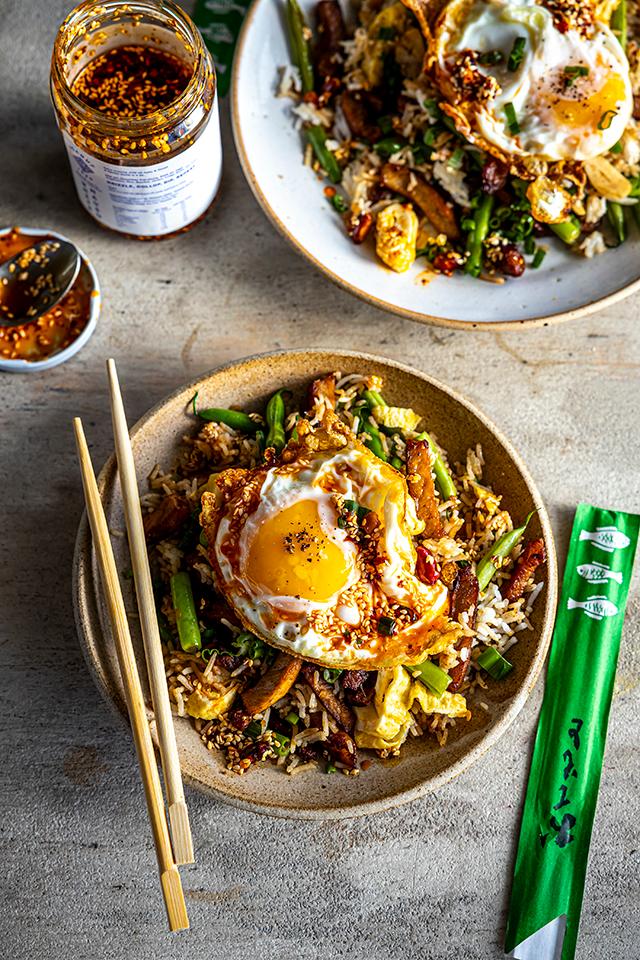 Five-spice pulled pork fried rice in a wok