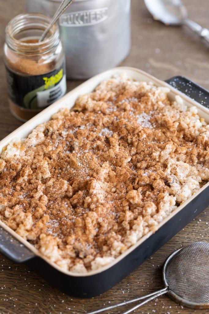 Close-up of the apple crisp topping on the rice pudding, showcasing the textures