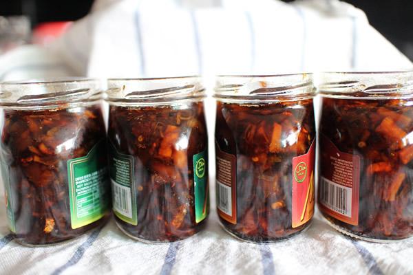 jars of XO sauce on a market stall