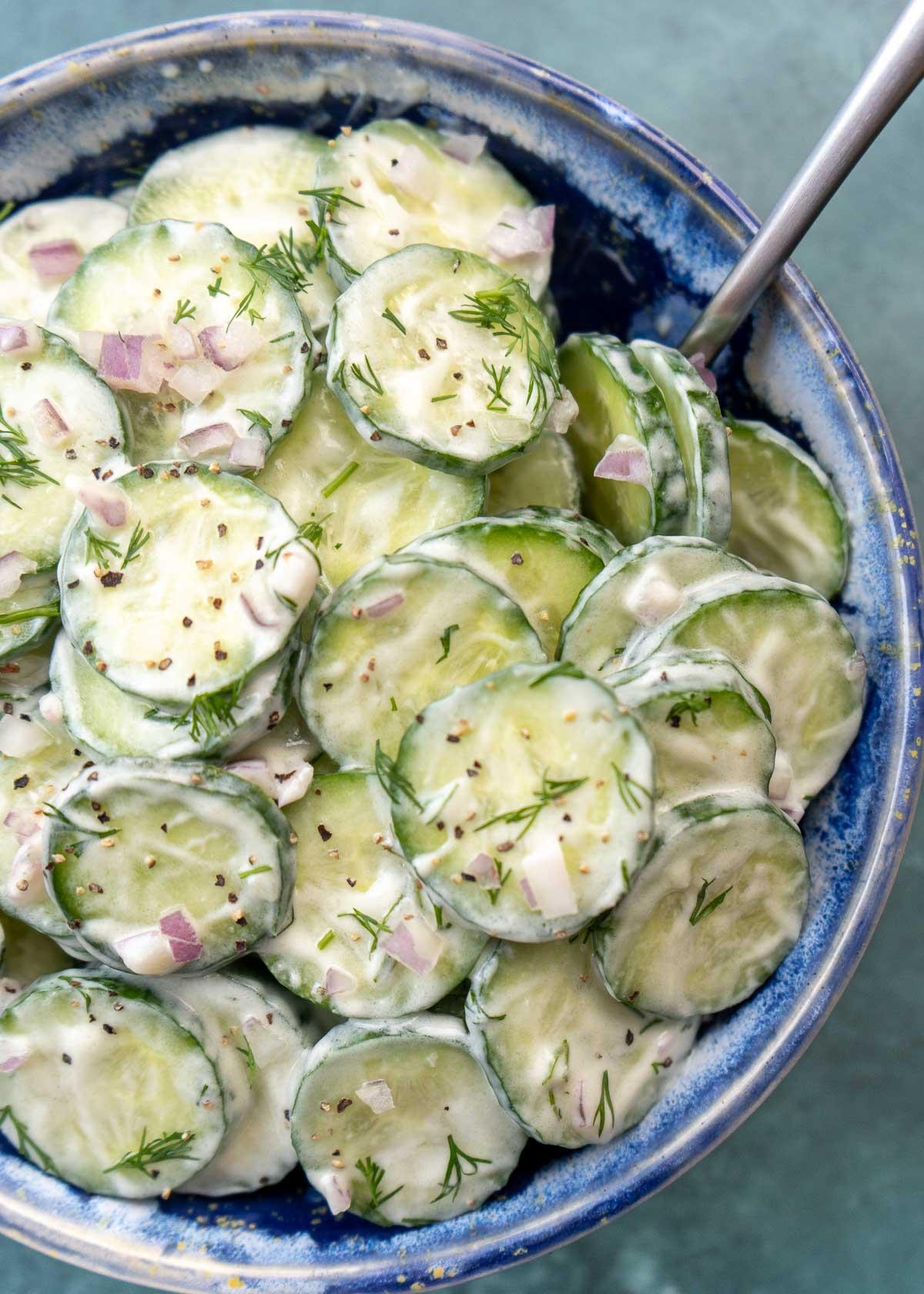 bowl of creamy dill and cucumber risotto garnished with fresh dill