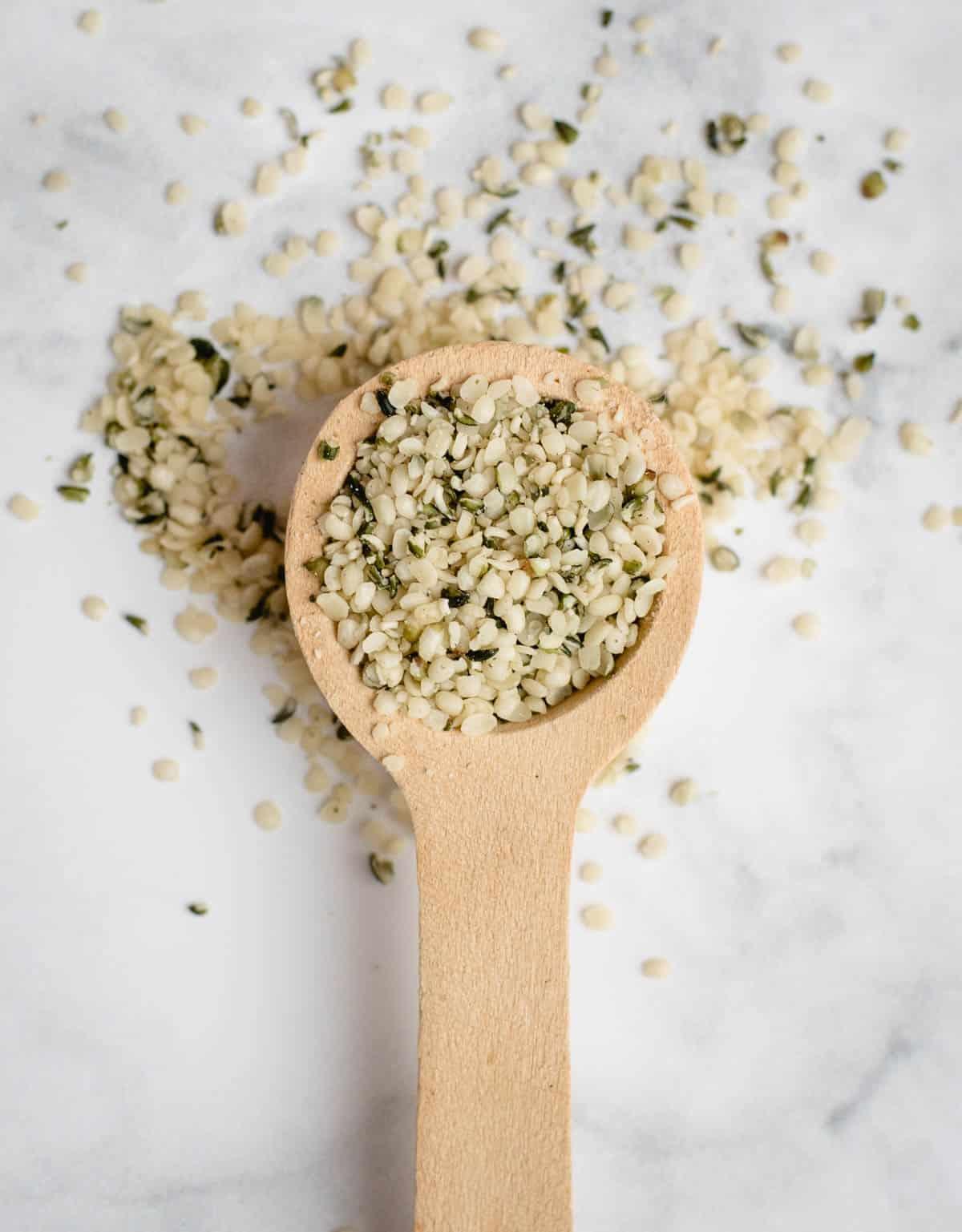 close-up of hemp hearts sprinkled on a spoon