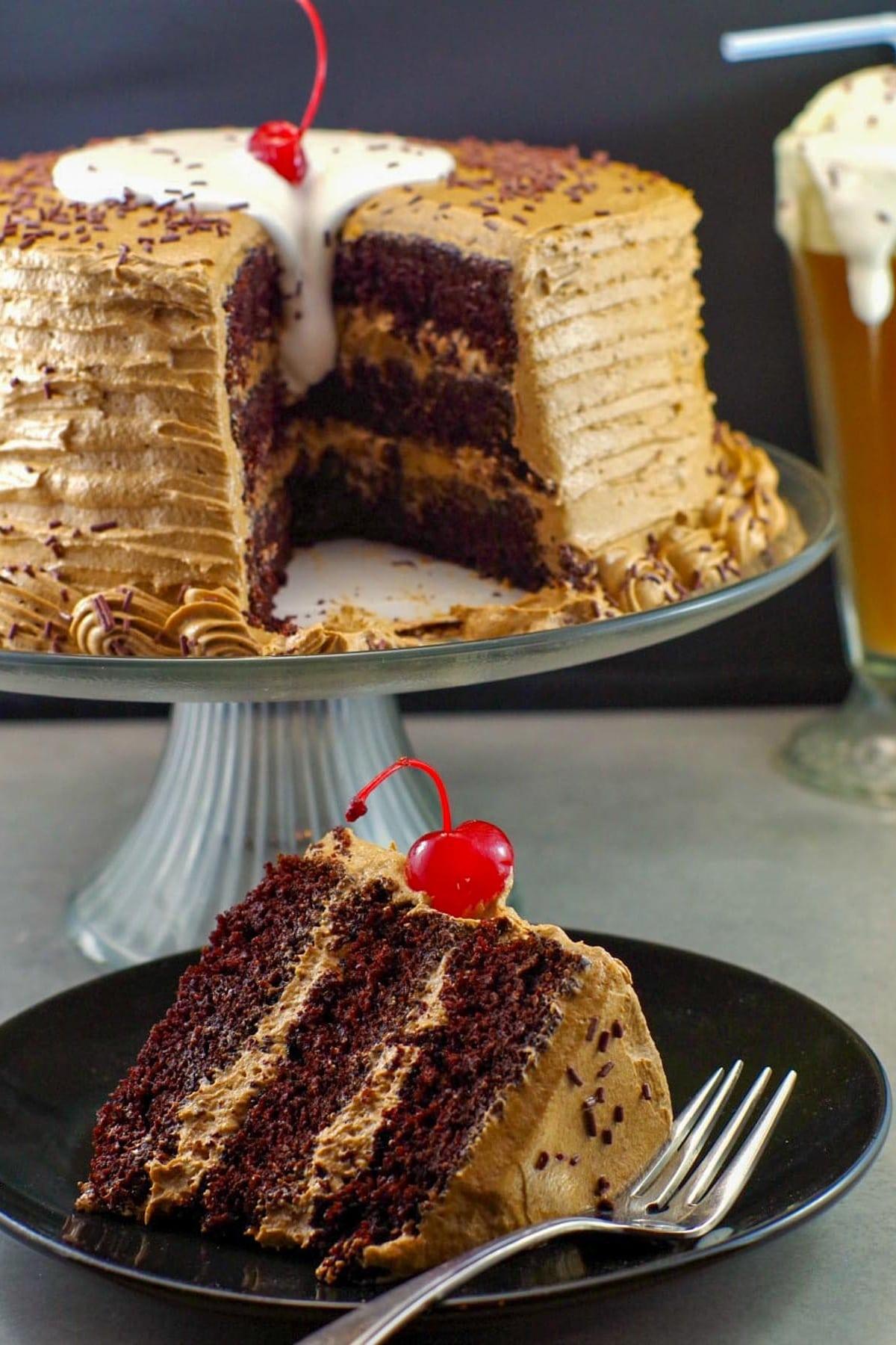 slice of root beer float cake with root beer bottle in background
