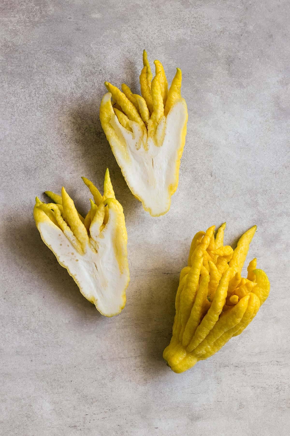 whole and sliced buddha's hand citron
