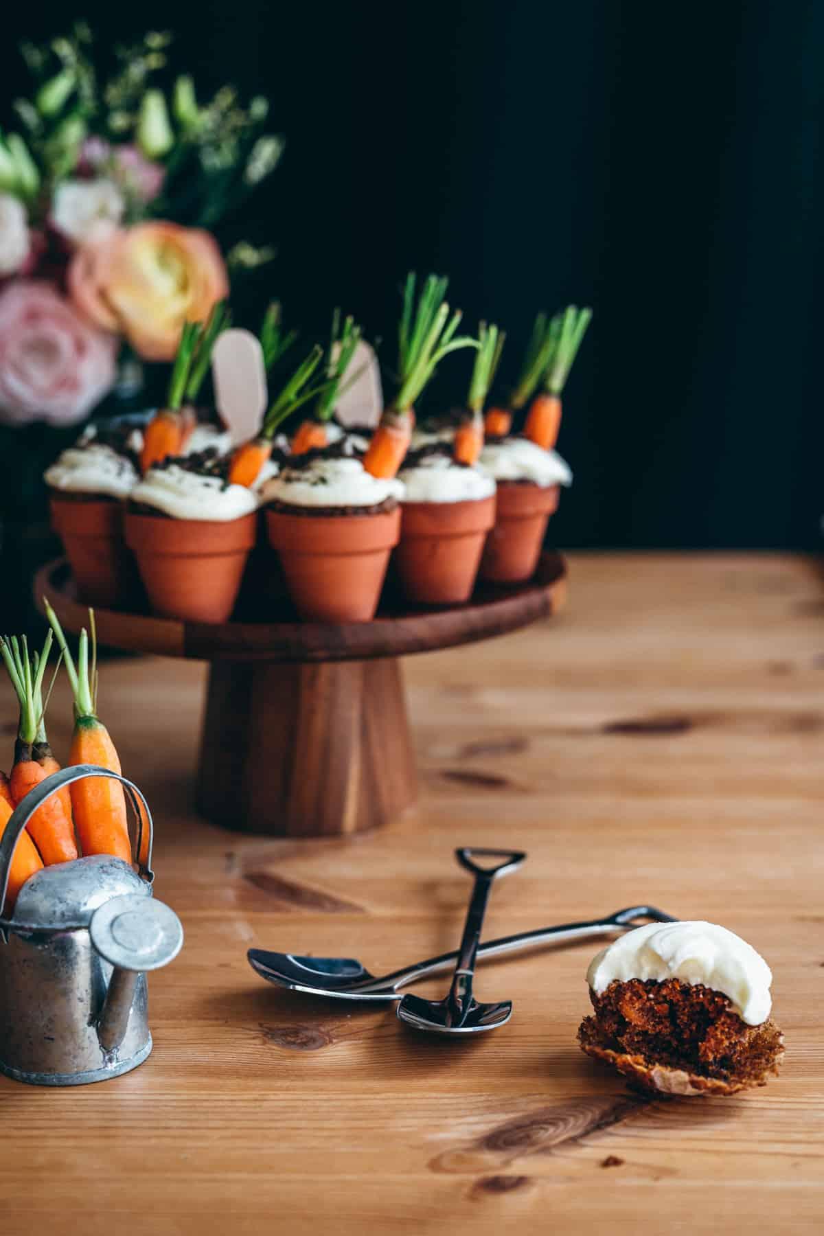 carrot cake mini cupcakes arranged on a tiered serving stand