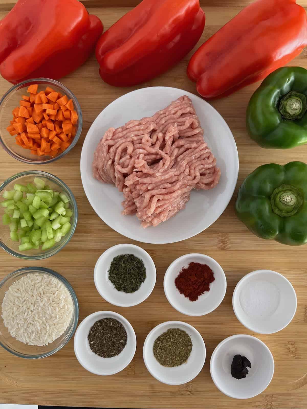 overhead shot of uncooked bell peppers prepped for stuffing