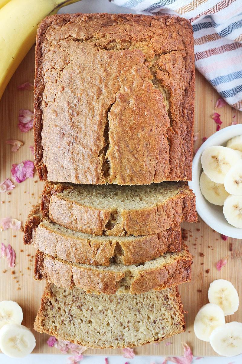 overhead shot of sliced gluten-free banana bread with sea salt flakes