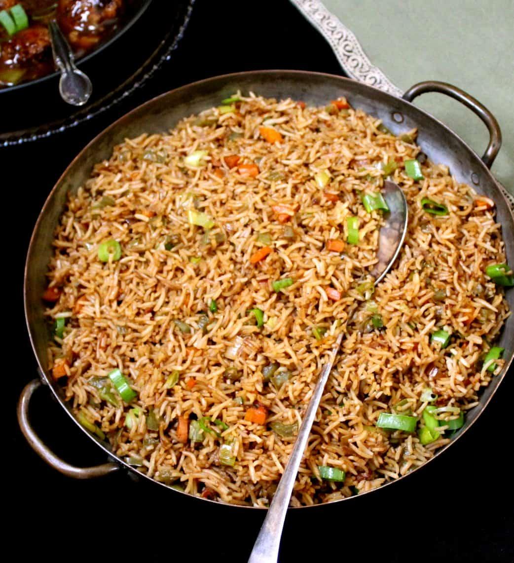 Overhead shot of Indian Spiced Vegetable Fried Rice in a wok