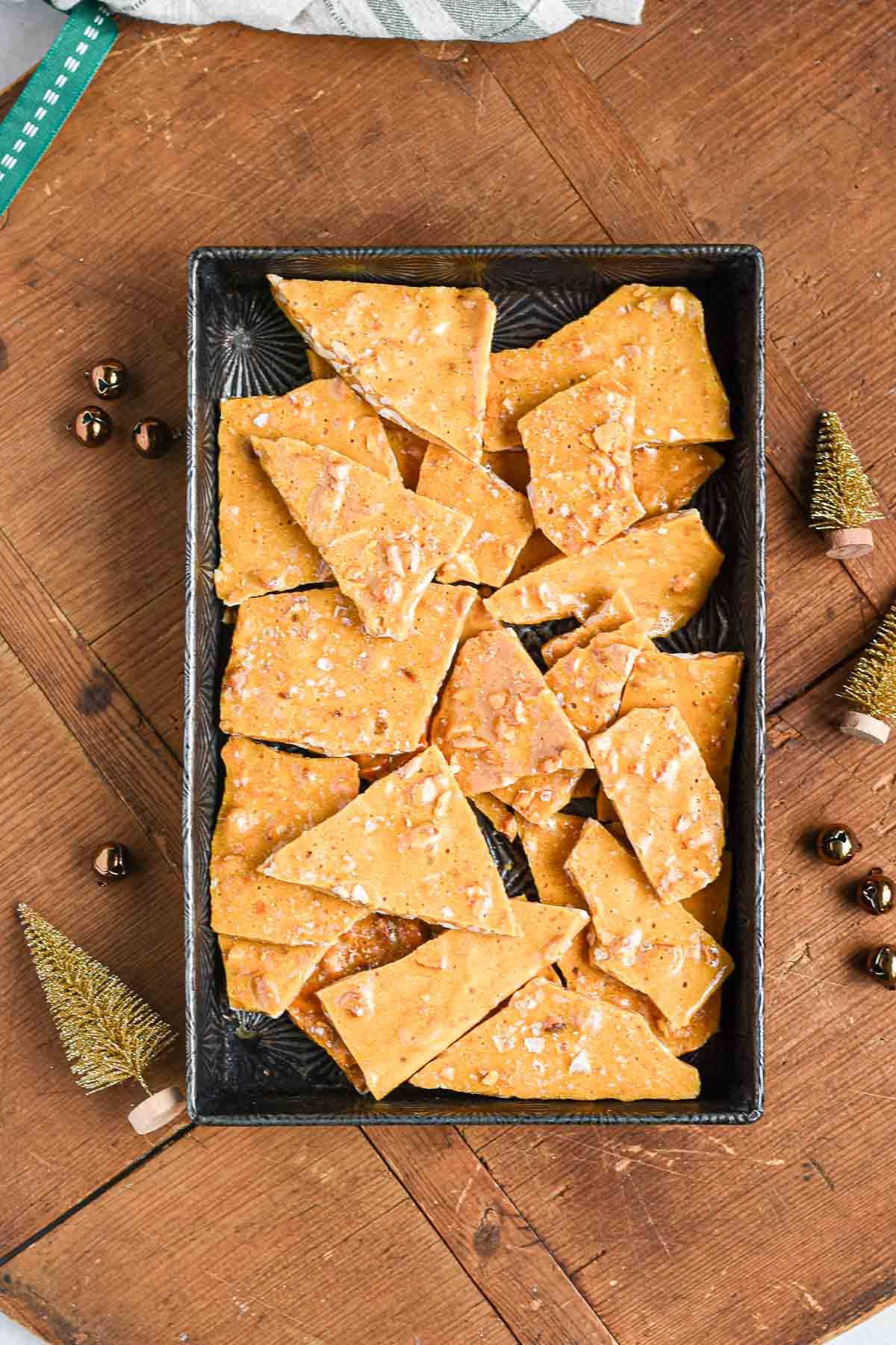 close up of peanut brittle ingredients arranged on a wooden table