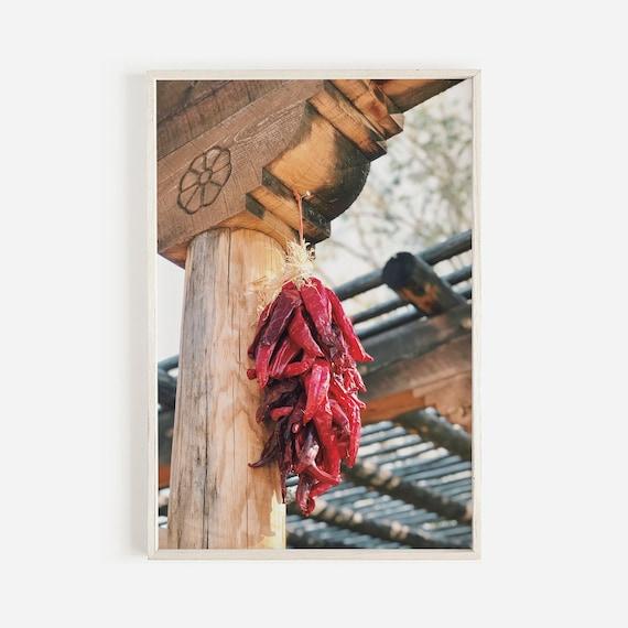 california chiles and marjoram on a wooden surface