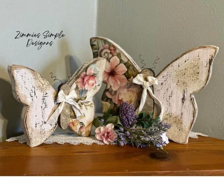 Different rice paper decorations, such as flowers, butterflies, and geometric shapes, laid out on a table