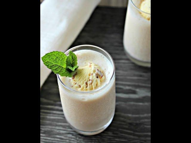 close-up shot of a glass of walnut apple lassi
