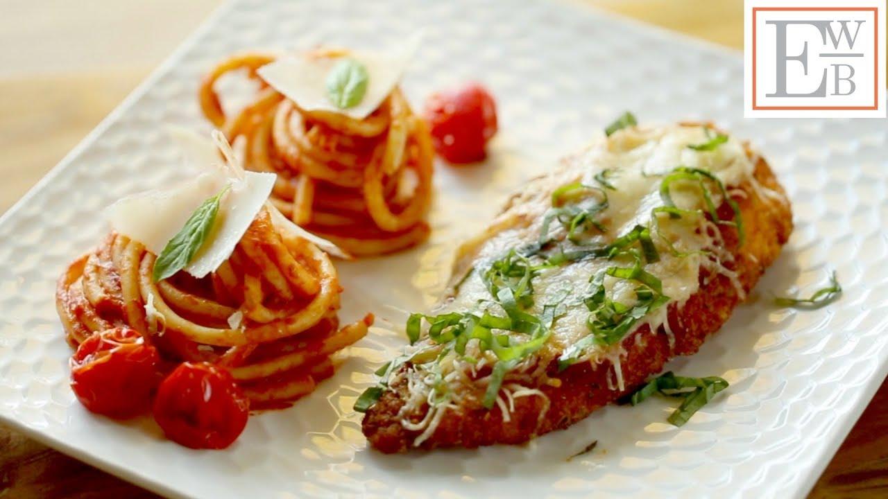 upscale chicken parmesan plated beautifully with basil garnish