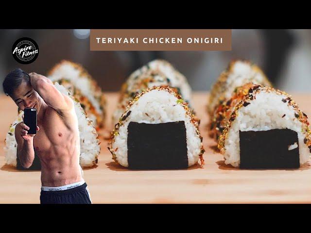 Close-up of hands shaping onigiri with quinoa and chicken