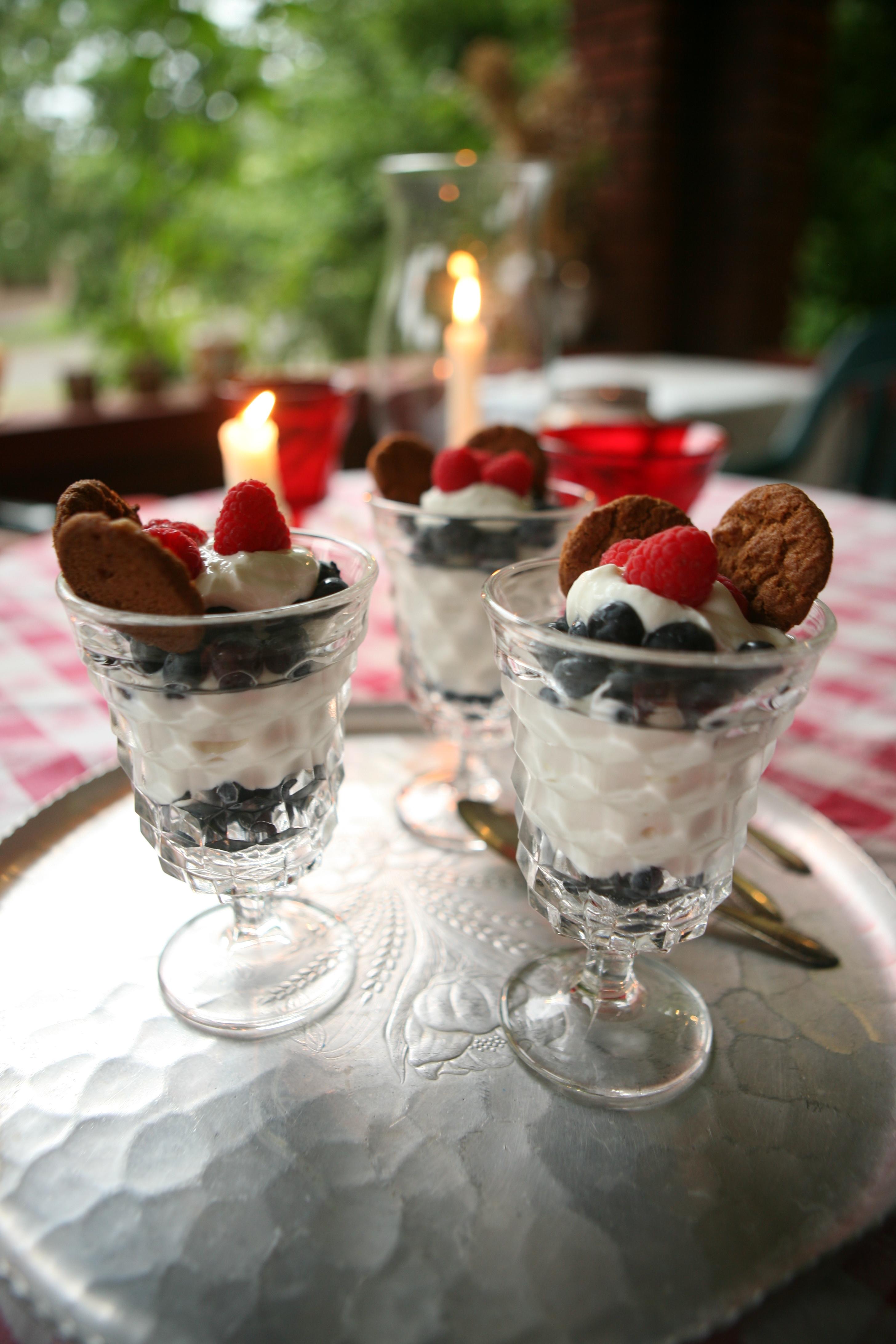 sunny afternoon porch with person holding a slice of berry dessert