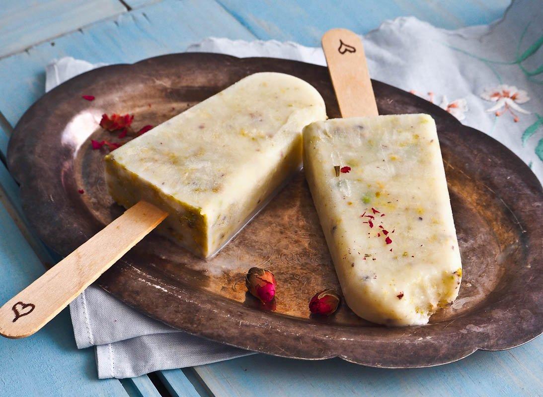 close up of homemade pistachio rosewater popsicles showing texture