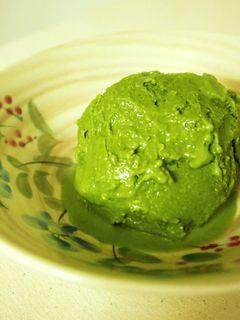 A bowl of homemade matcha cotton candy with ingredients