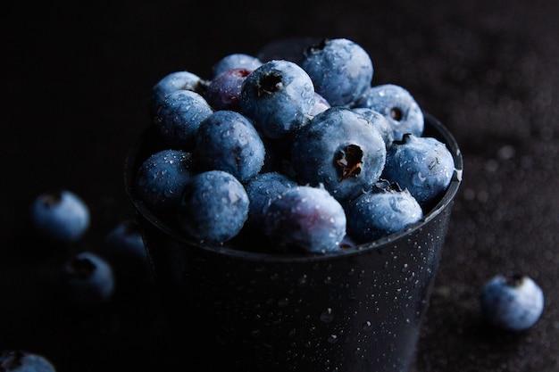 close up shot of fresh blueberries in a bowl