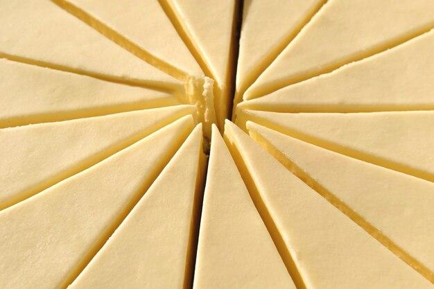 close-up of a slice being cut from the cheesecake