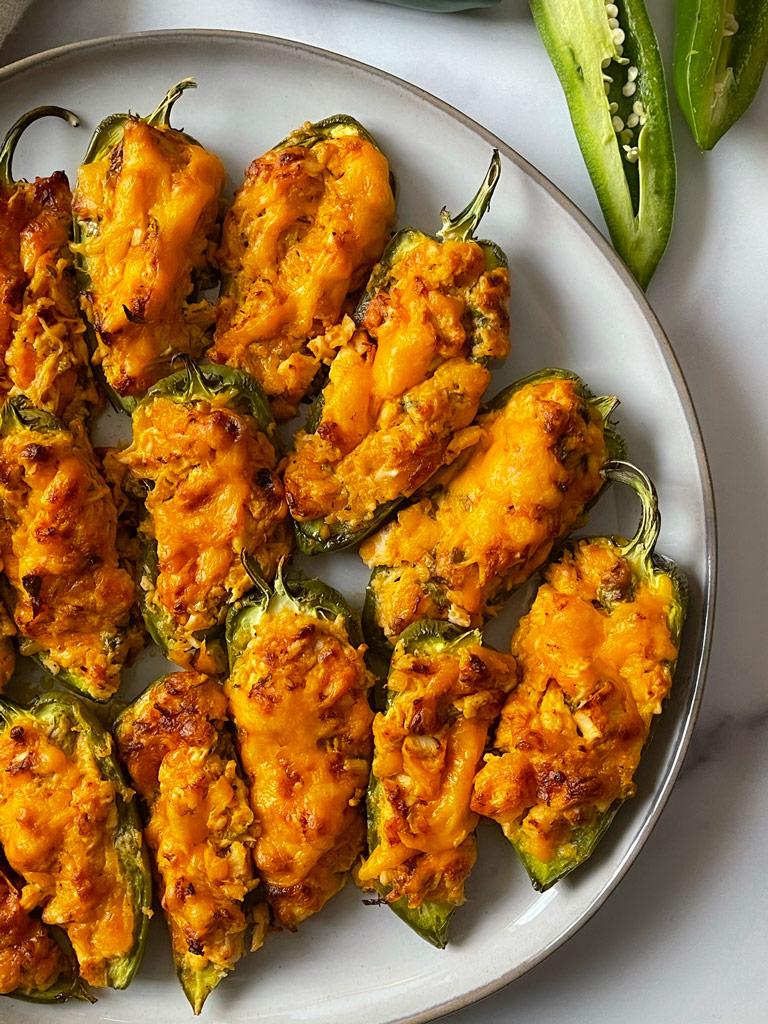 close-up shot of preparing buffalo chicken stuffed jalapenos