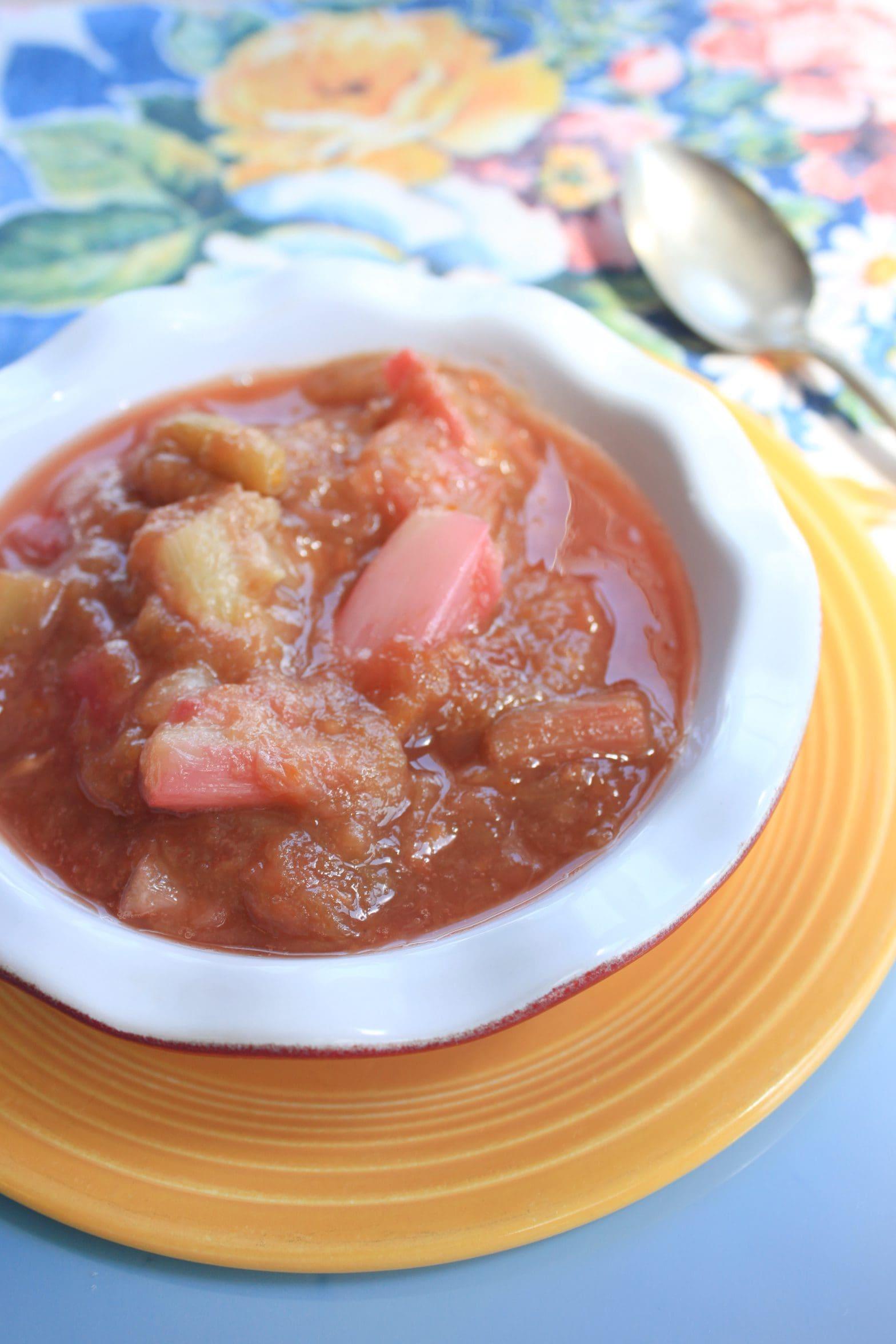 close-up of gingerbread rhubarb compote simmering in a pot
