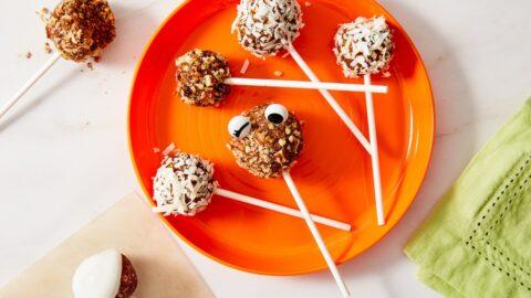 A group of people enjoying carrot cake popsicles outdoors