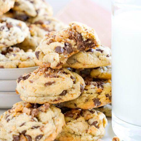 close up of a stack of toffee chocolate chip cookies