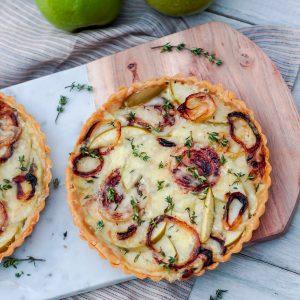 overhead shot of mushroom truffle baked apples with a sprig of thyme