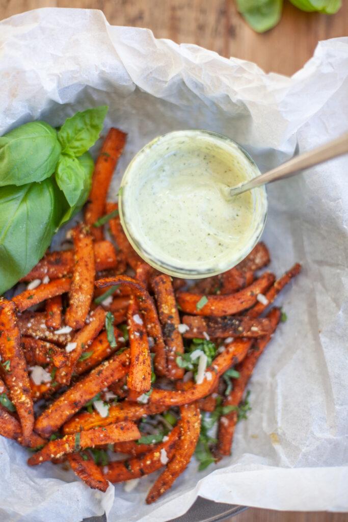 raw carrot fries seasoned with black pepper and parmesan