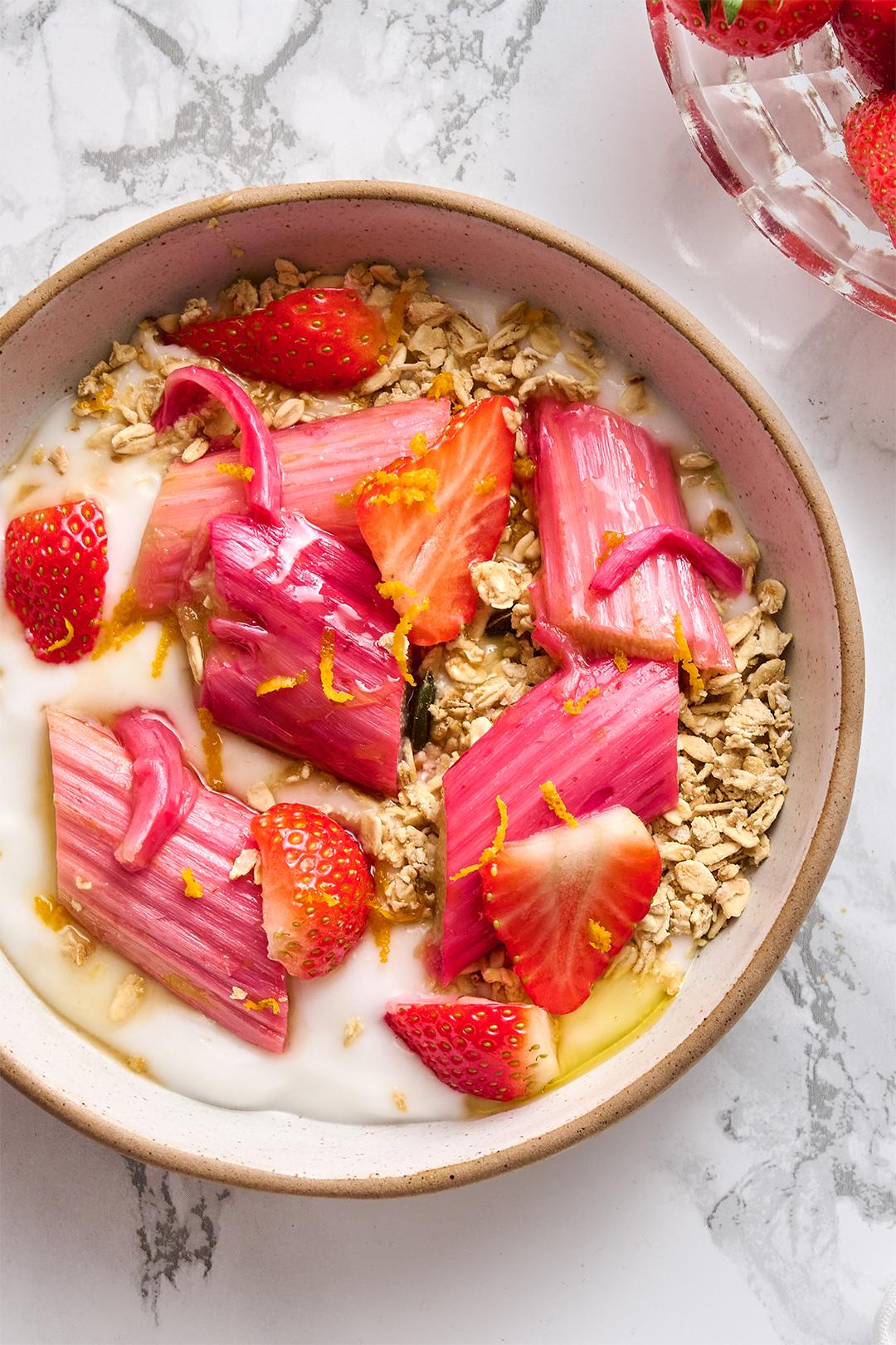 Rose Geranium Rhubarb Compote served over yogurt with a sprinkle of granola