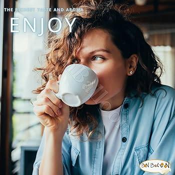 woman enjoying a cup of cardamom coffee
