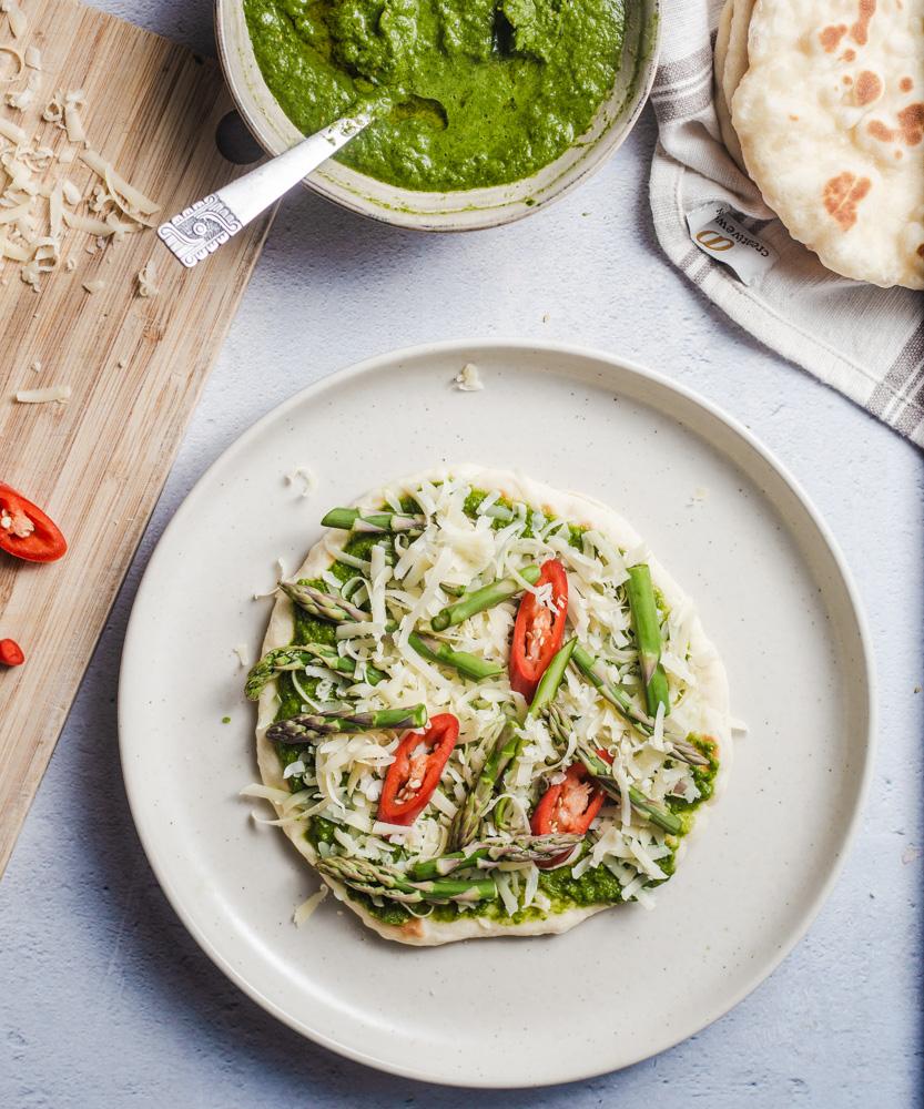 a plate of cilantro himalayan flatbreads served with a yogurt dip