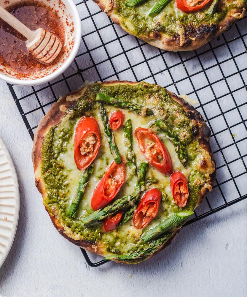 flatbreads topped with cilantro and pink salt