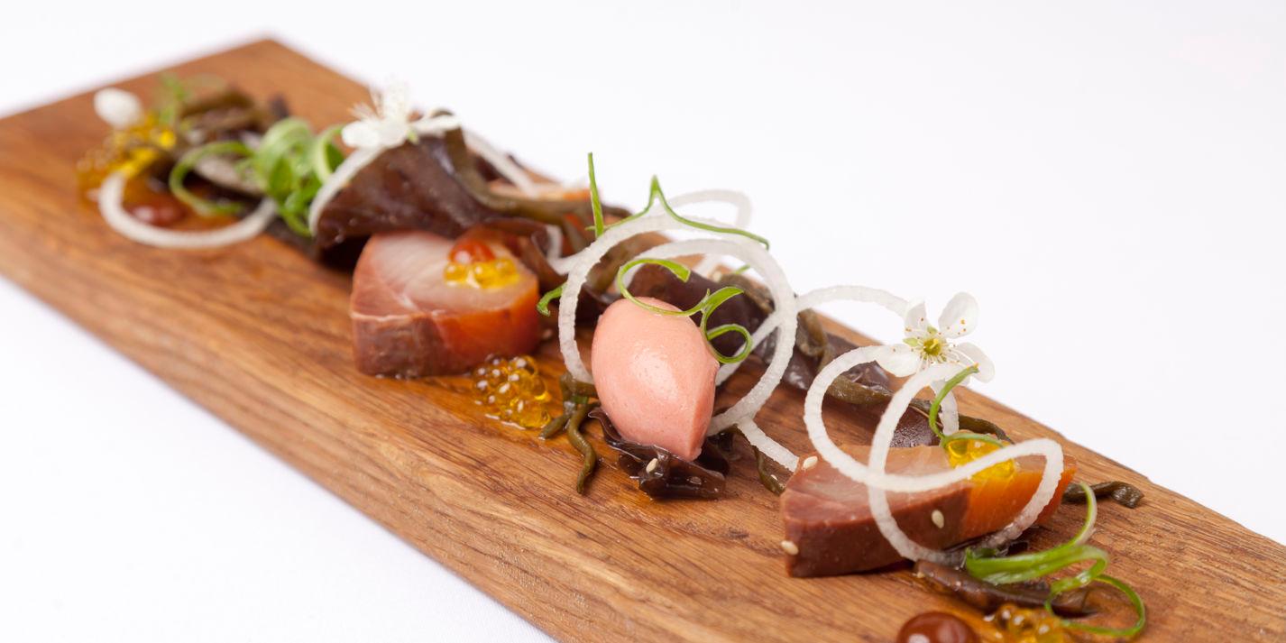 close up of fresh hamachi being marinated