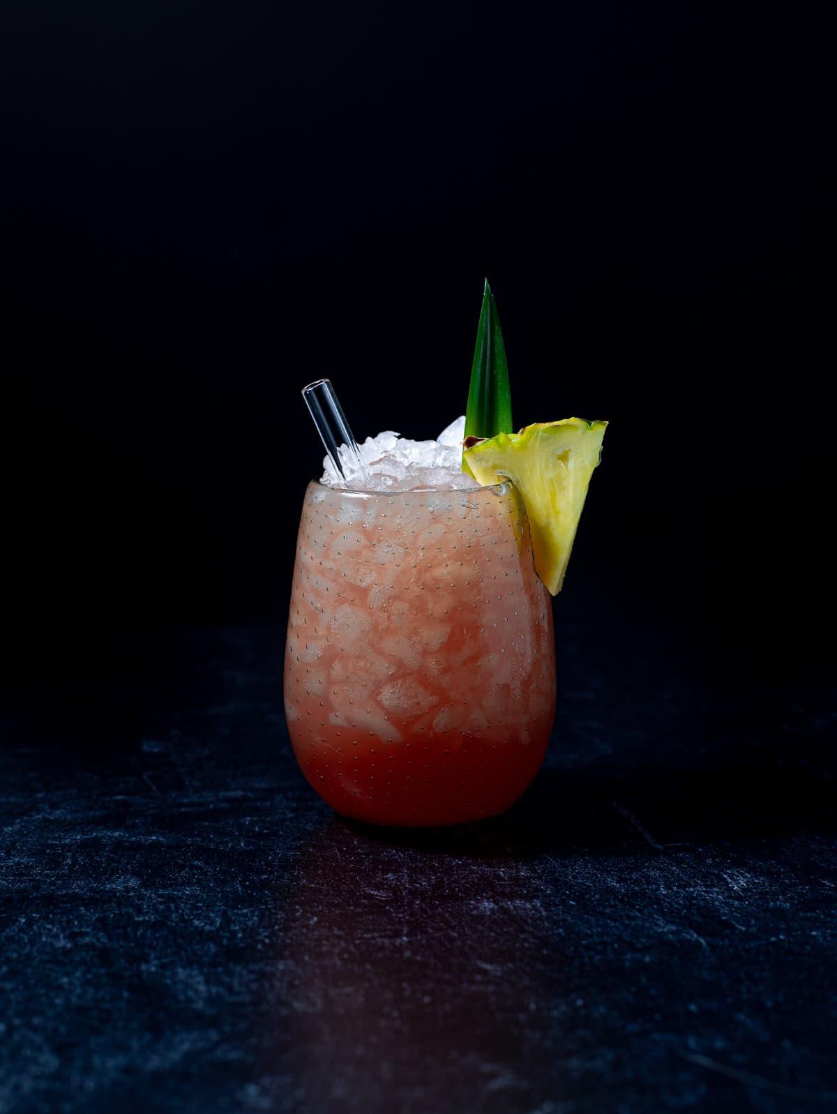 Close-up shot of a Virgin Mai Tai Mojito in a highball glass with ice