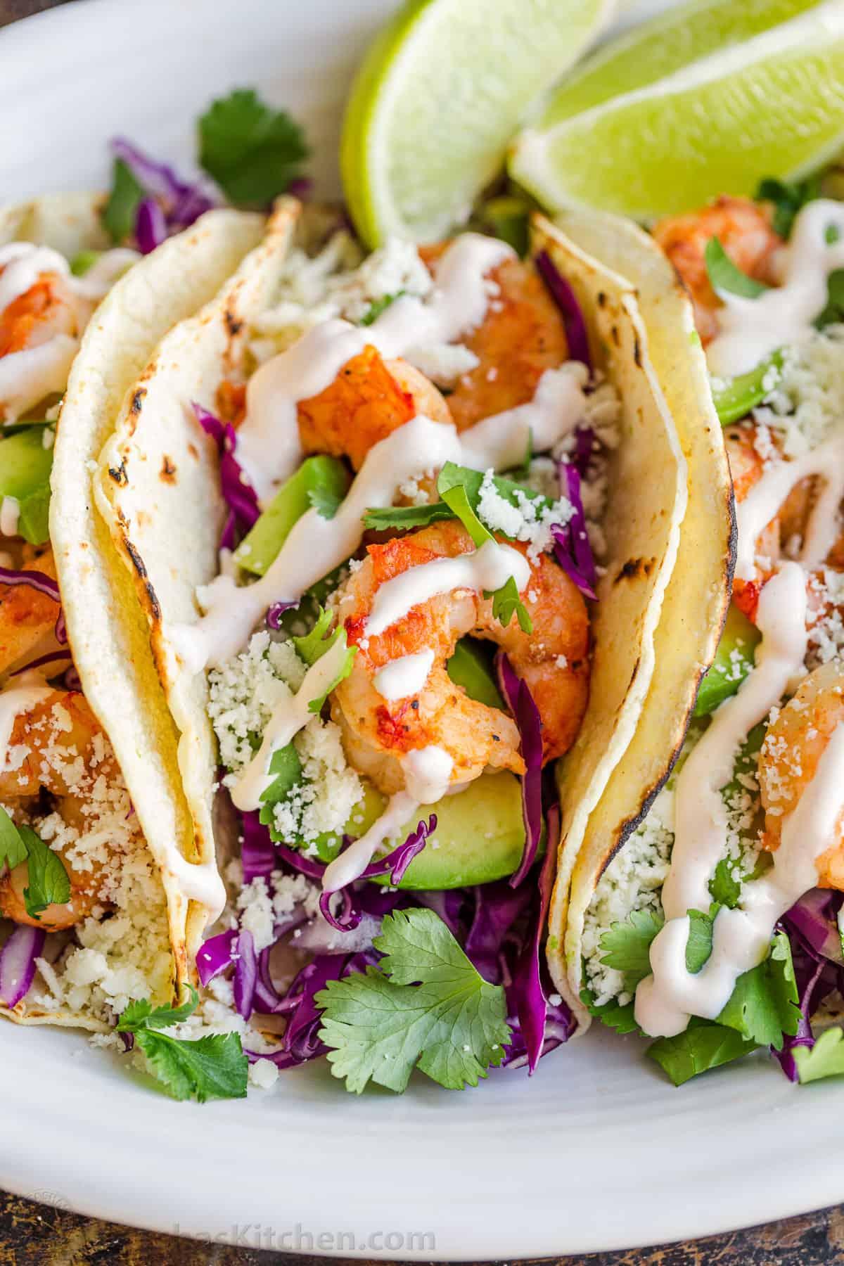 close up of delicious looking spicy grilled shrimp tacos