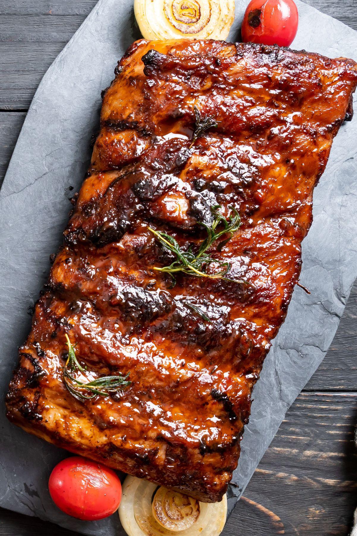 close-up of orange-rosemary bbq ribs on a grill