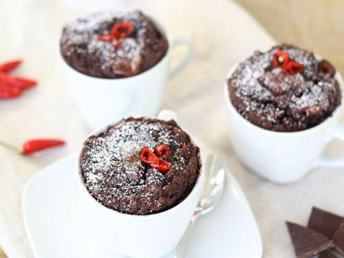 ingredients for a dark chocolate cayenne pepper mug cake arranged on a counter