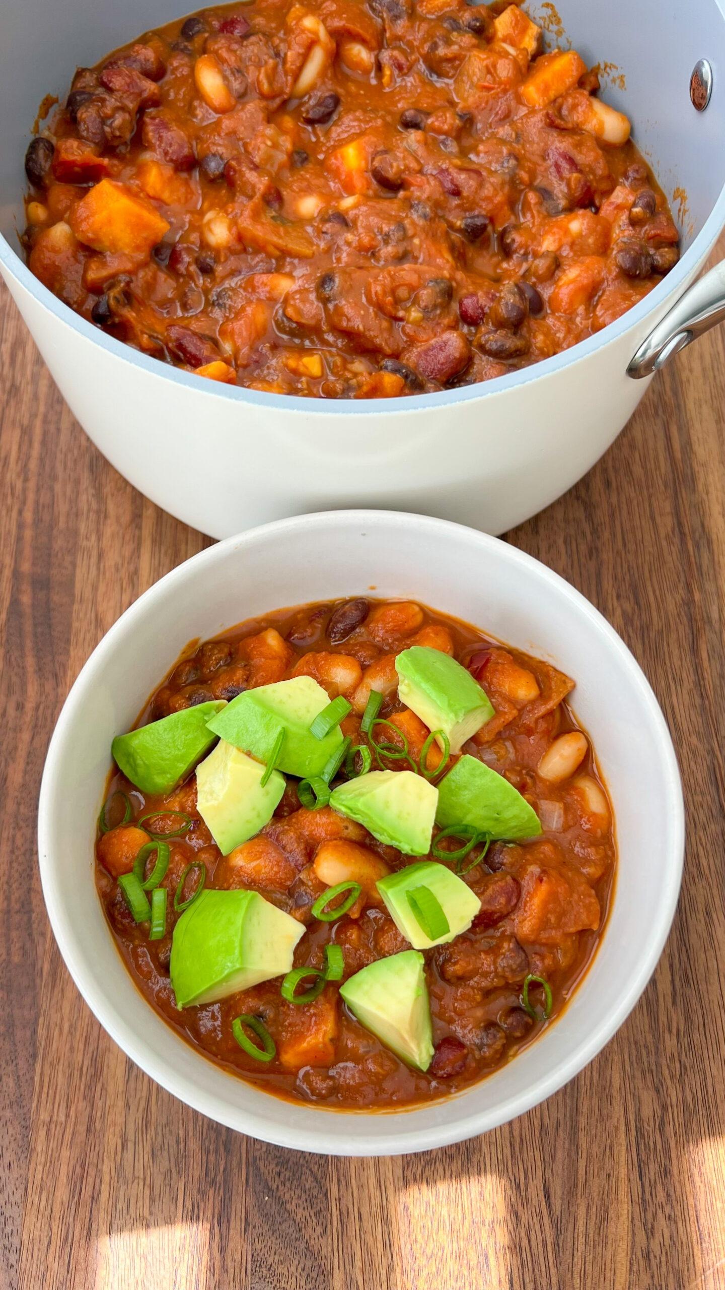 ingredients for spicy vegan chili with peanut butter arranged on a wooden table
